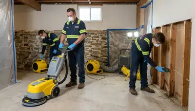 Water damage restoration team in Lansing, MI providing water removal and cleanup services